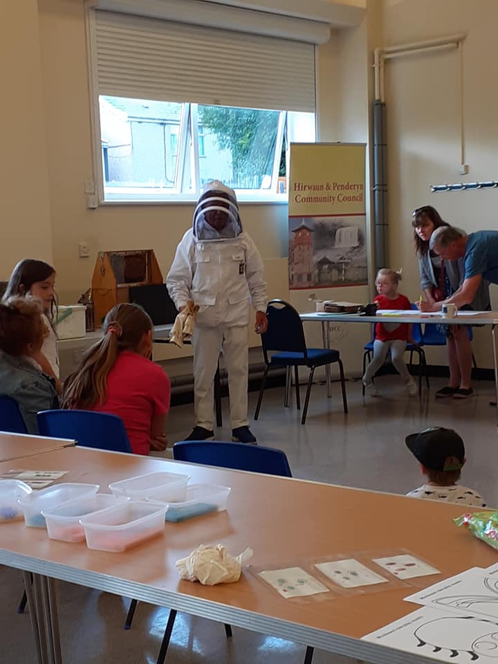 man in a bee keeping suit