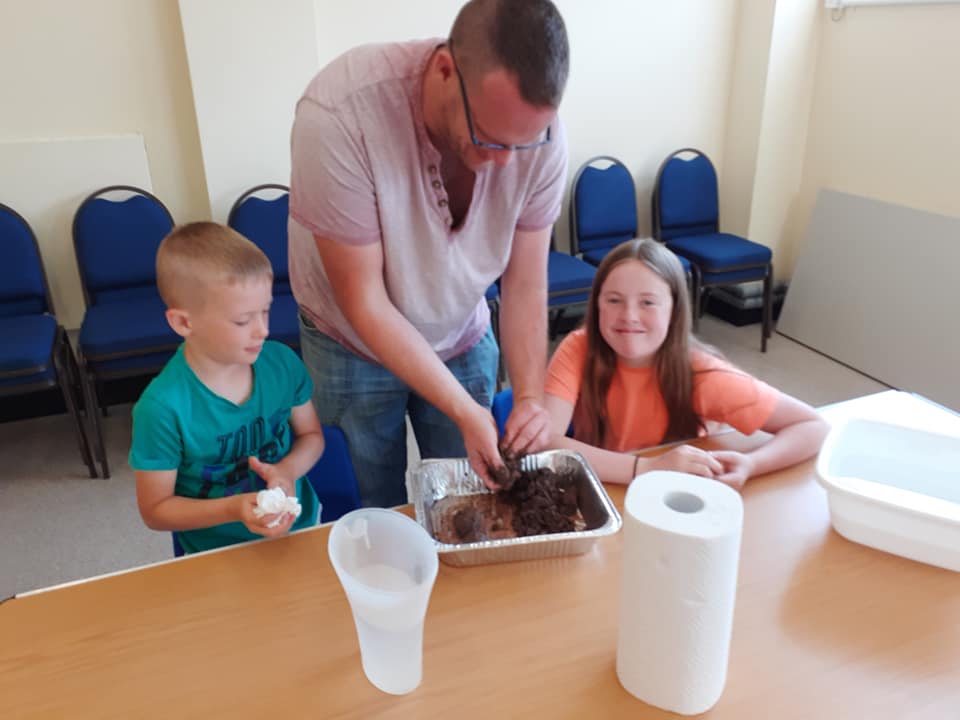 children making seed bombs