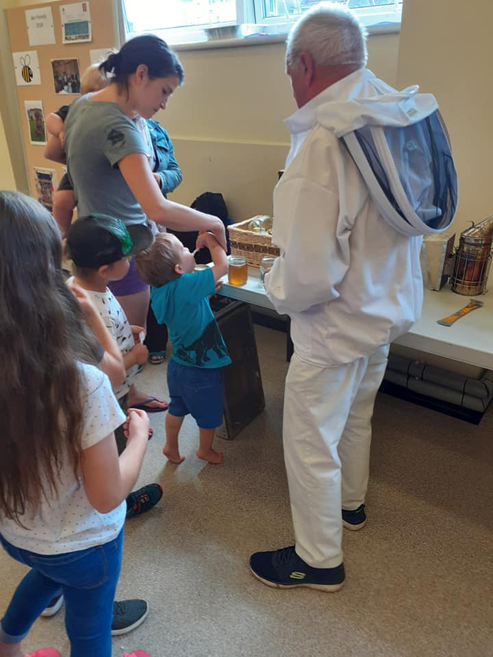 man in a bee keeping suit